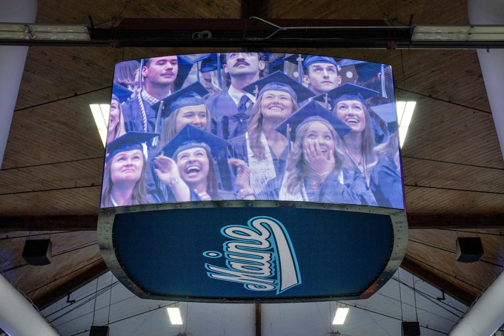 A photo of students shown on the jumbotron