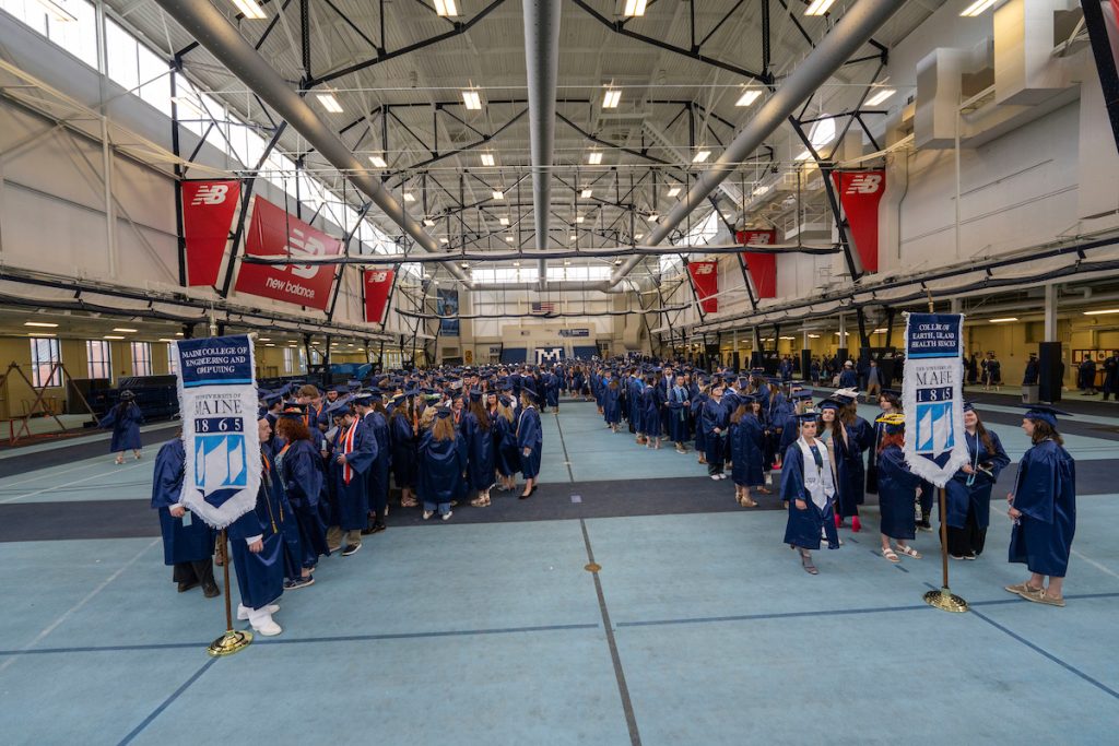 A photo of graduating students in the fieldhouse