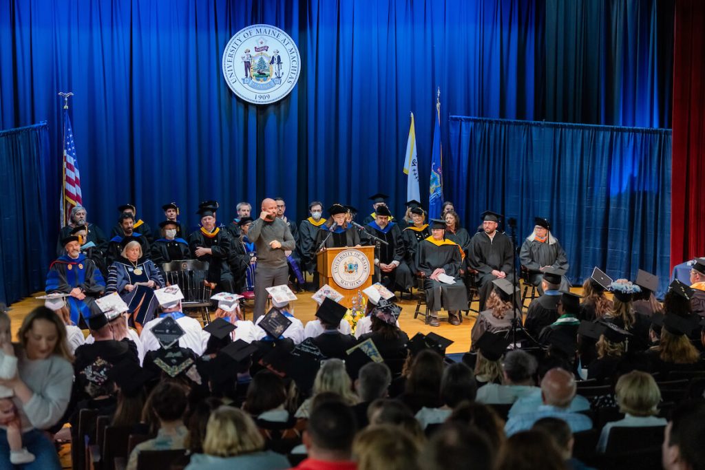 A photo of the stage and audience at the 2024 UMaine Machias graduation ceremony