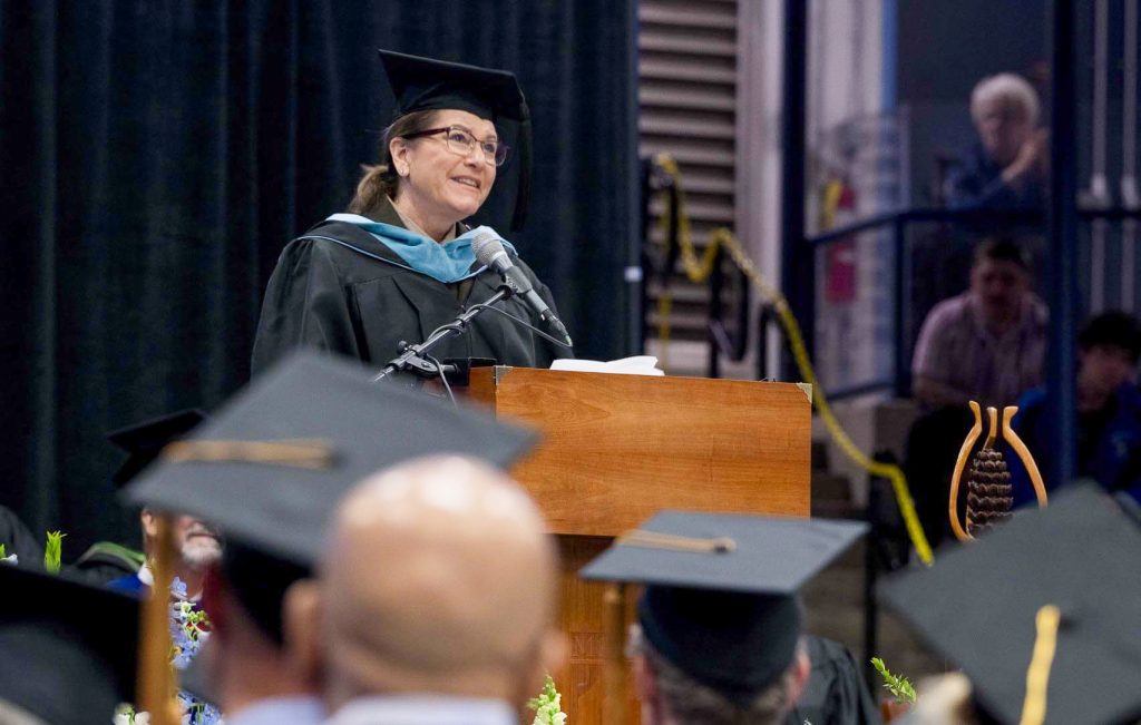 A photo of Diane Dunn speaking at UMaine's commencement