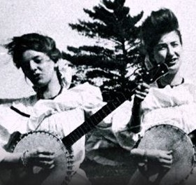 2 women playing banjos photo