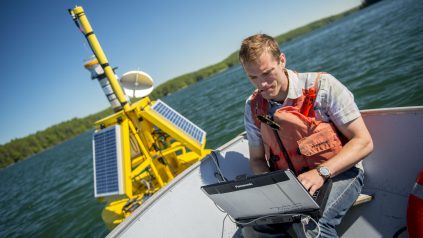Researcher works on SeaNET bouy